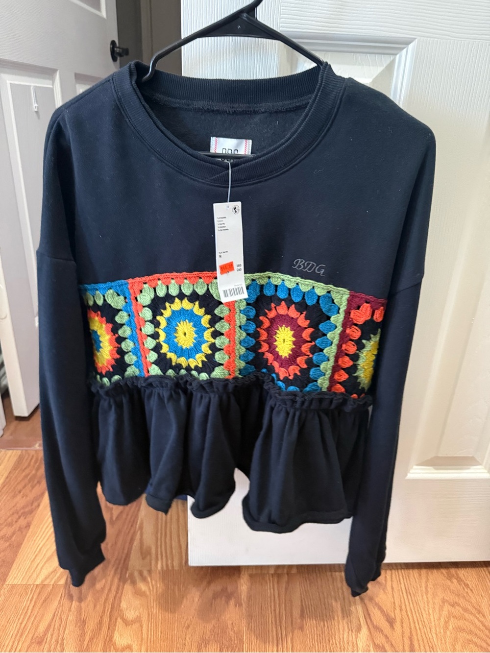 BDG Black Sweatshirt with Colorful Crochet Panel and Peplum Hem